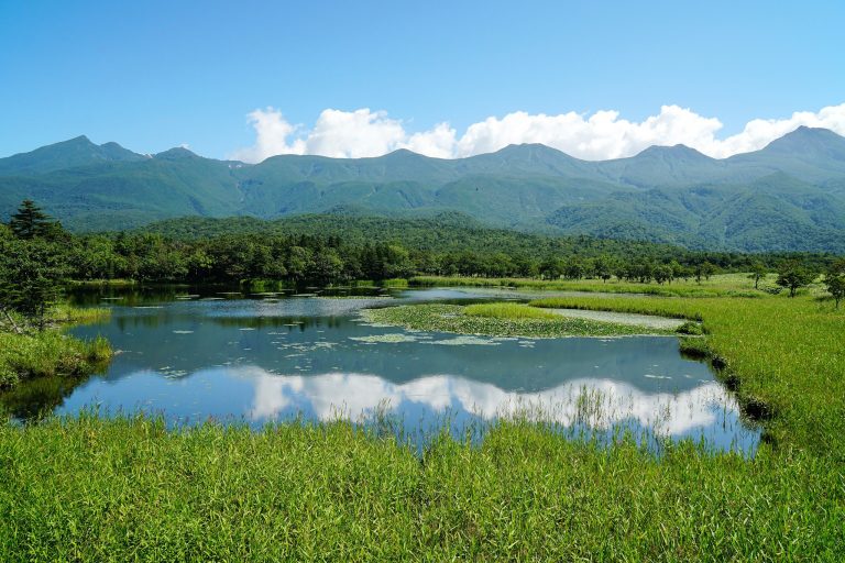 The first lake of Shiretoko Goko with the Shiretoko mountain range reflected in still water